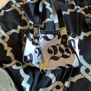 Lesportsac L.A.M.B by Gwen Stefani mini barrel bag